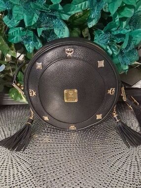 SOLD MCM Black Round Leather Crossbody with Gold Hardware and Tassels